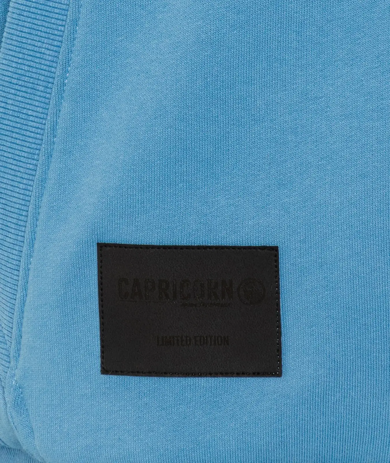 Kunstlederpatch schwarz mit Capricorn Logo